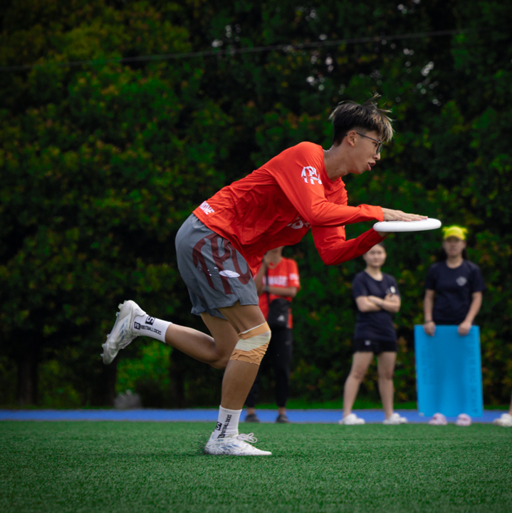 Image of Ultimate Frisbee players engaging in the sport